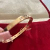 Bracelet Cartier authentique en or rose 18 carats et 4 diamants, taille 17