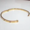 Bracelet jonc Love de Cartier | Or jaune 18 carats | Certificat et écrin | Taille 19