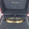 Bracelet Cartier Love en or jaune 18 carats, taille 18, fermoir à vis, neuf, avec boîte et papier