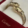 Bracelet Cartier Panthère Cougar Trinity en or jaune, blanc et rose 18 carats, service 2025
