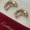 Boucles d'oreilles Trinity Cartier Panthère Cougar en or jaune, blanc et rose 18 carats, service 2025