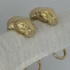 Boucles d'oreilles Trinity Cartier Panthère Cougar en or jaune, blanc et rose 18 carats, service 2025