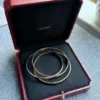 Bracelet jonc Cartier Trinity Tricolore en or 18 carats, modèle classique