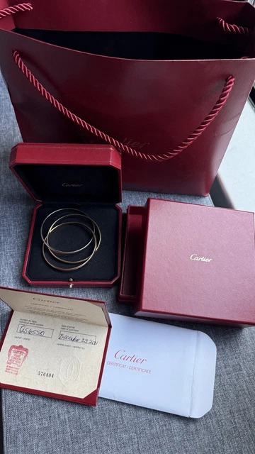 Bracelet jonc Cartier Trinity Tricolore en or 18 carats, modèle classique