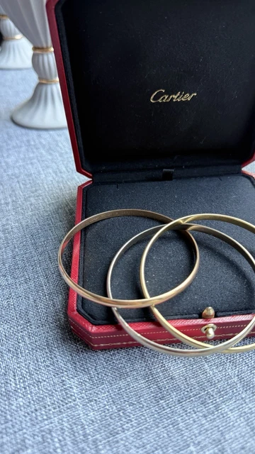 Bracelet jonc Cartier Trinity Tricolore en or 18 carats, modèle classique