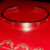 Bracelet manchette Love en or blanc Cartier 18