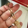 Montre Cartier Trinity pour femme, or jaune 18 carats et diamants ~ Boîte et papiers