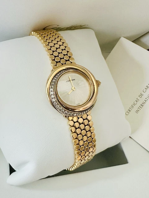 Montre Cartier Trinity pour femme, or jaune 18 carats et diamants ~ Boîte et papiers