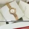 Montre Cartier Trinity pour femme, or jaune 18 carats et diamants ~ Boîte et papiers