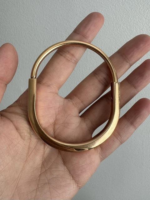 Bracelet jonc Tiffany & Co. à fermoir cadenas, or rose 18 carats, 31,8 grammes