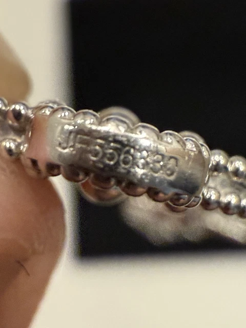 Bracelet Van Cleef & Arpels Alhambra vintage en or blanc 18 carats guilloché, 5 motifs