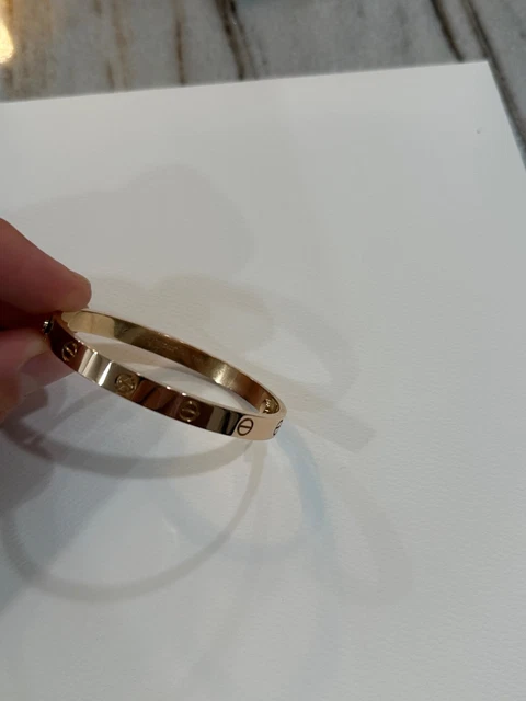 bracelet love cartier en or rose taille 17