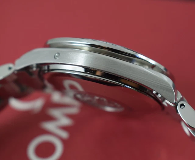 Omega Speedmaster Triple Date 3523.80.00, papiers, boîte générique, 1 an, GTE, 2003