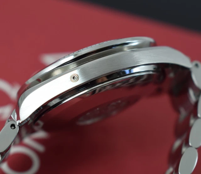 Omega Speedmaster Triple Date 3523.80.00, papiers, boîte générique, 1 an, GTE, 2003