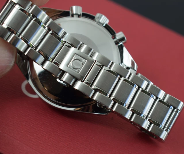 Omega Speedmaster Triple Date 3523.80.00, papiers, boîte générique, 1 an, GTE, 2003