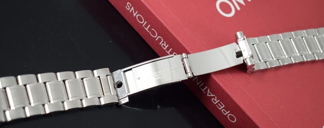 Omega Speedmaster Triple Date 3523.80.00, papiers, boîte générique, 1 an, GTE, 2003