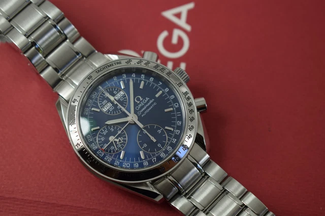 Omega Speedmaster Triple Date 3523.80.00, papiers, boîte générique, 1 an, GTE, 2003