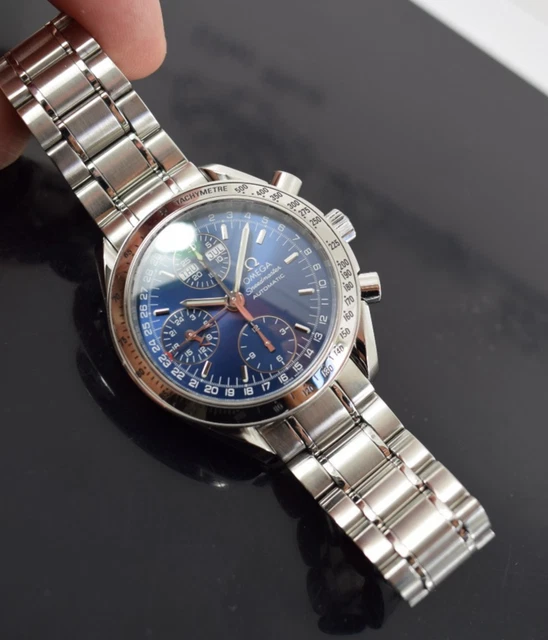 Omega Speedmaster Triple Date 3523.80.00, papiers, boîte générique, 1 an, GTE, 2003