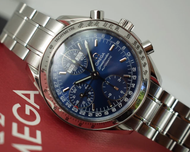 Omega Speedmaster Triple Date 3523.80.00, papiers, boîte générique, 1 an, GTE, 2003