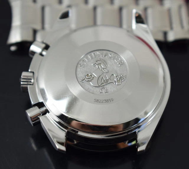 Omega Speedmaster Triple Date 3523.80.00, papiers, boîte générique, 1 an, GTE, 2003