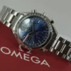 Omega Speedmaster Triple Date 3523.80.00, papiers, boîte générique, 1 an, GTE, 2003