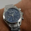 Omega Speedmaster Triple Date 3523.80.00, papiers, boîte générique, 1 an, GTE, 2003
