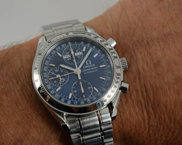 Omega Speedmaster Triple Date 3523.80.00, papiers, boîte générique, 1 an, GTE, 2003