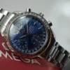Omega Speedmaster Triple Date 3523.80.00, papiers, boîte générique, 1 an, GTE, 2003
