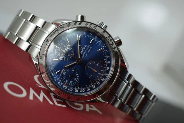 Omega Speedmaster Triple Date 3523.80.00, papiers, boîte générique, 1 an, GTE, 2003