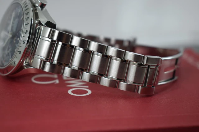 Omega Speedmaster Triple Date 3523.80.00, papiers, boîte générique, 1 an, GTE, 2003