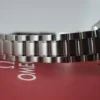 Omega Speedmaster Triple Date 3523.80.00, papiers, boîte générique, 1 an, GTE, 2003